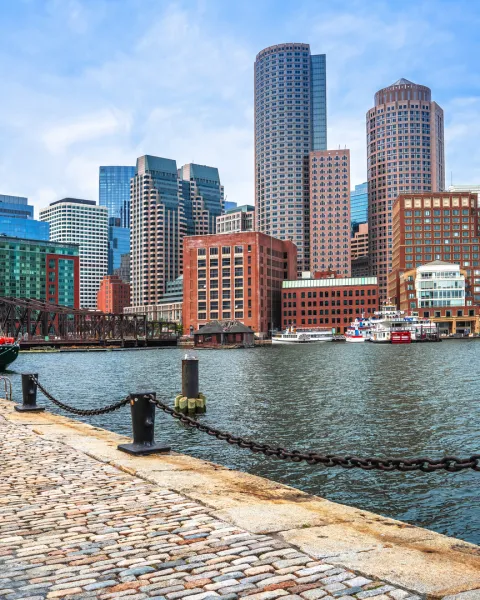 Scenic view of Boston Harbor and the Boston cityscape.