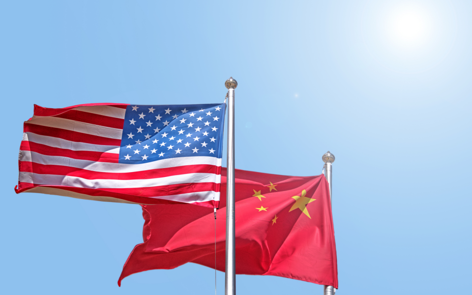 Chinese and American flags on a flagpole