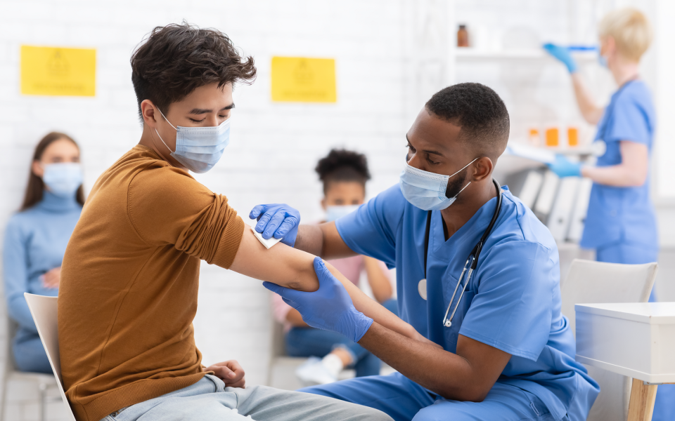 Person receiving COVID-19 vaccine