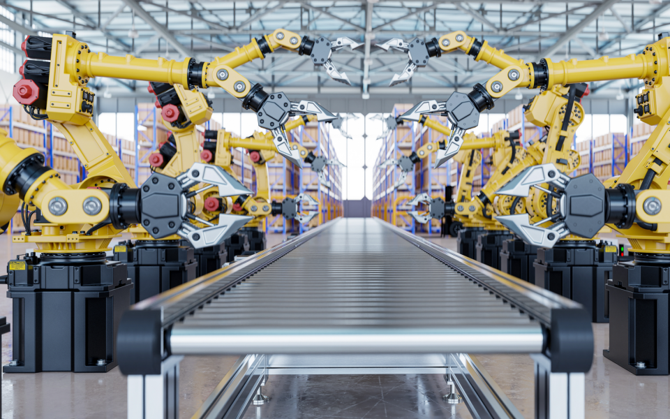 Automated robotics in a manufacturing plant.