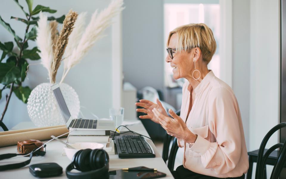 A woman working from her home office.