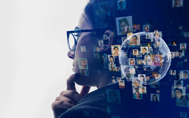 Side view of a woman's head as she considers people with the help of AI/