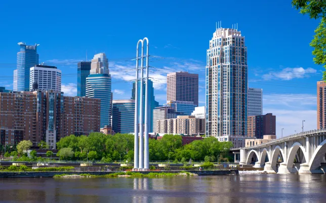 A skyline view of downtown Minneapolis and the Mississippi River.